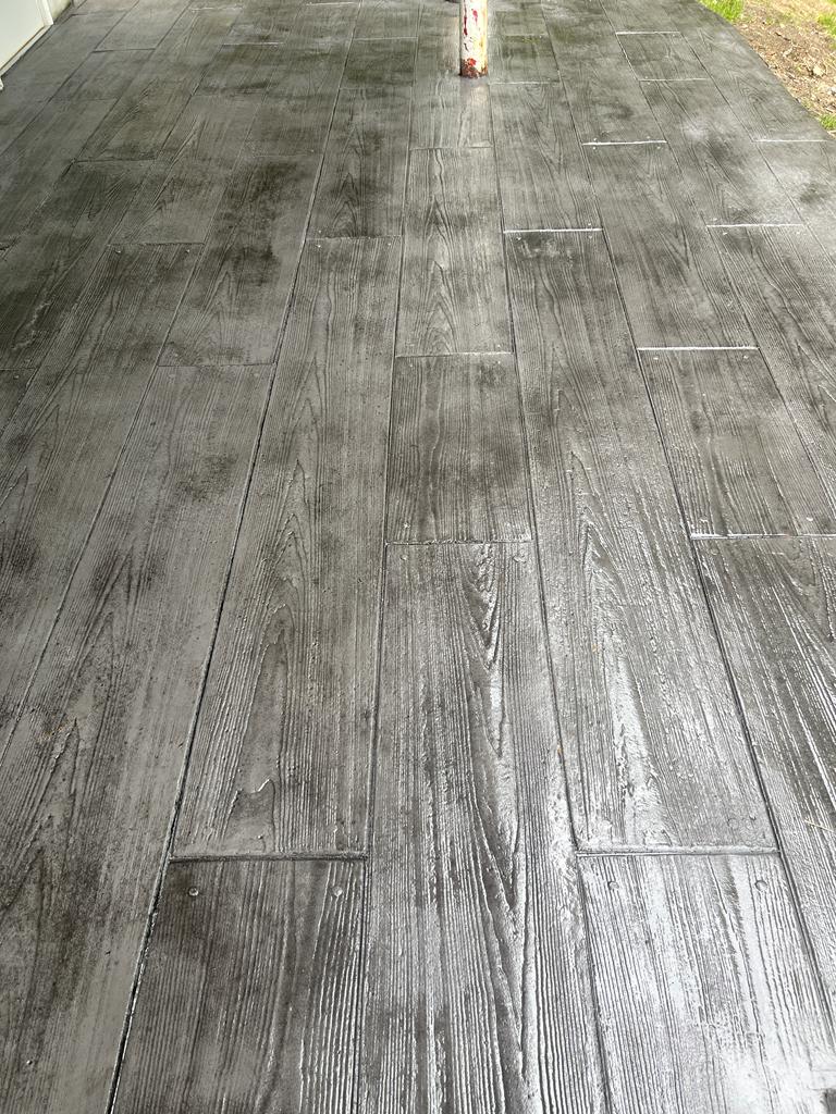 Wood plank stamped concrete porch