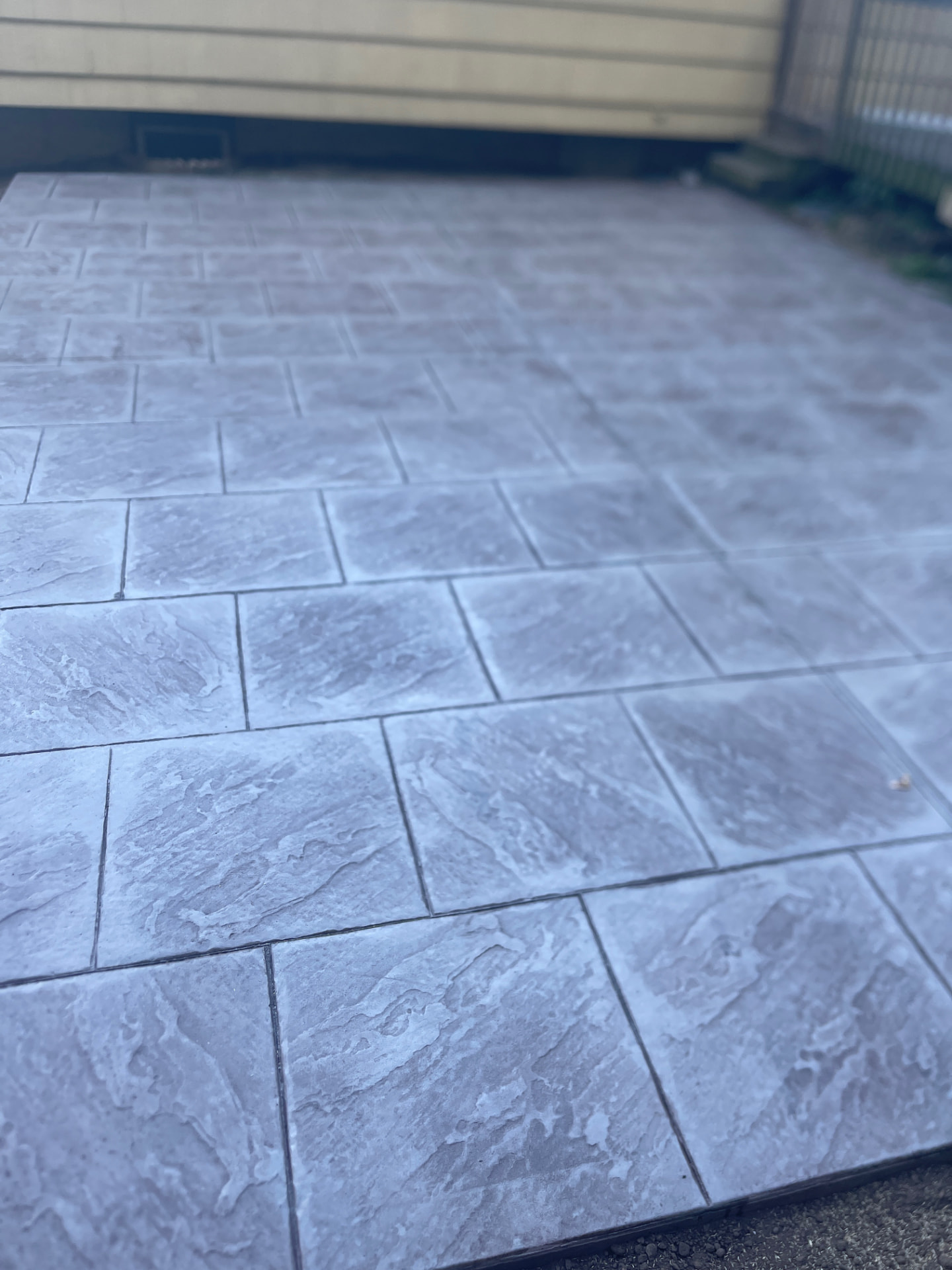 Close view of slate stamped concrete patio pattern