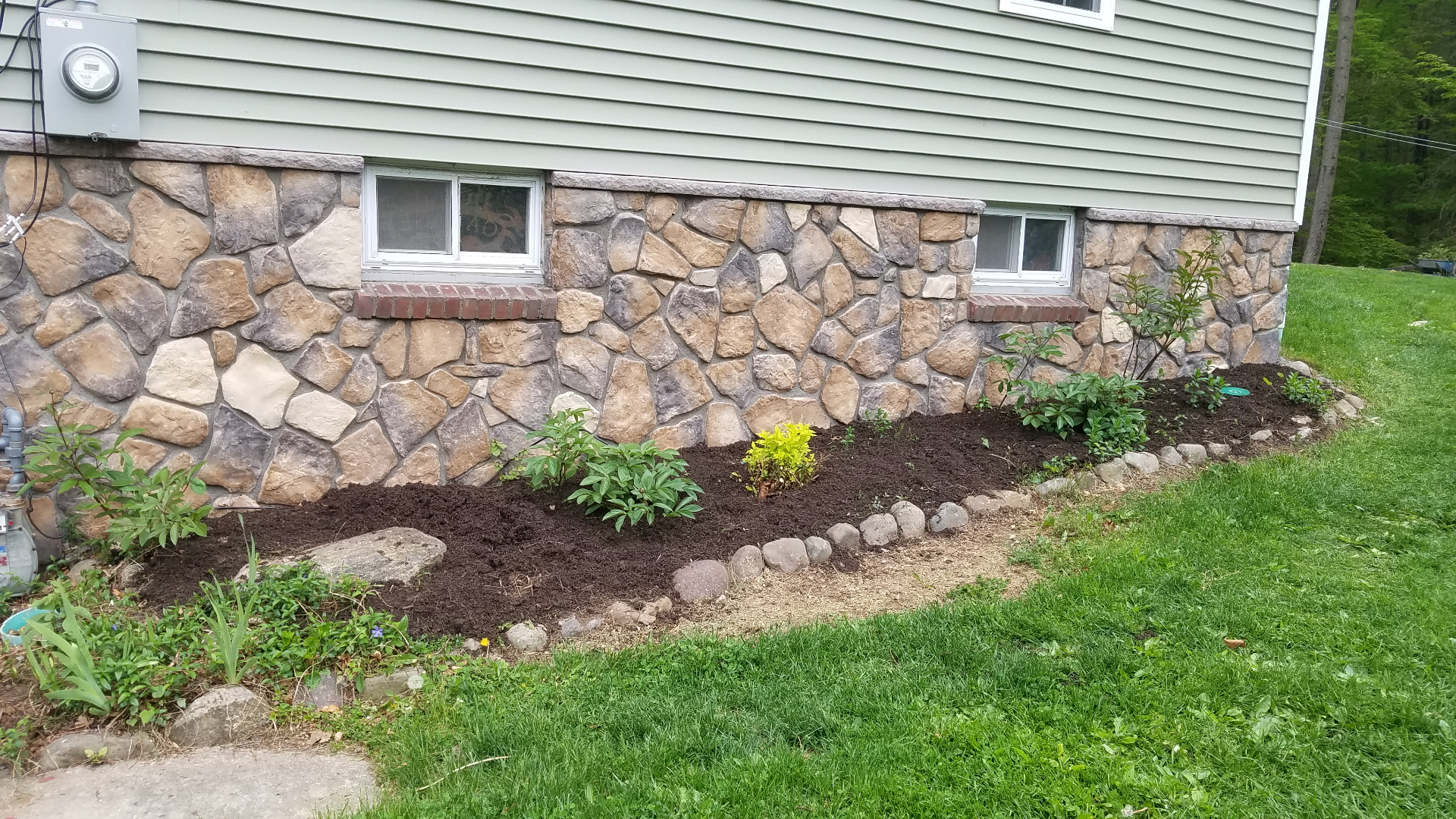 Natural stone veneer foundation facade